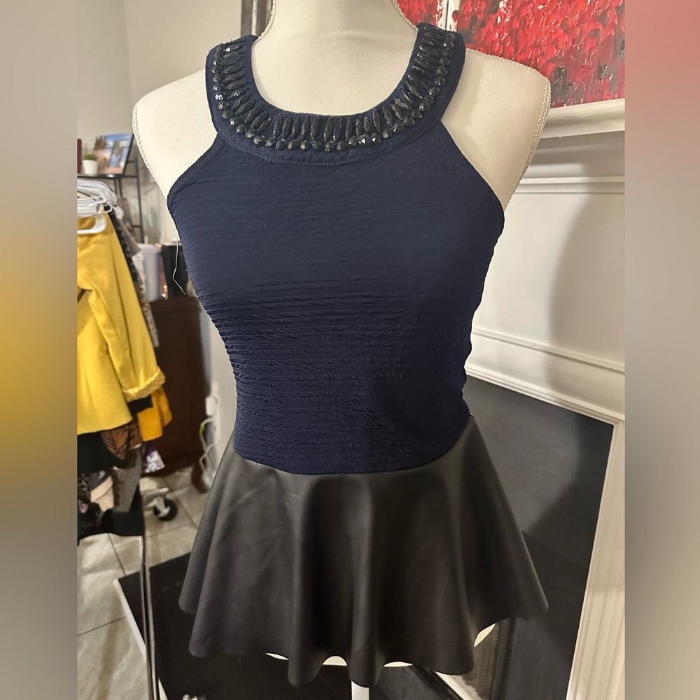 Navy peplum faux leather top